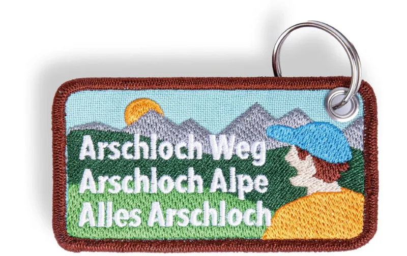 Swissmeme Schlüsselanhänger Arschloch Alpe, 8.2 x 4.5 cm